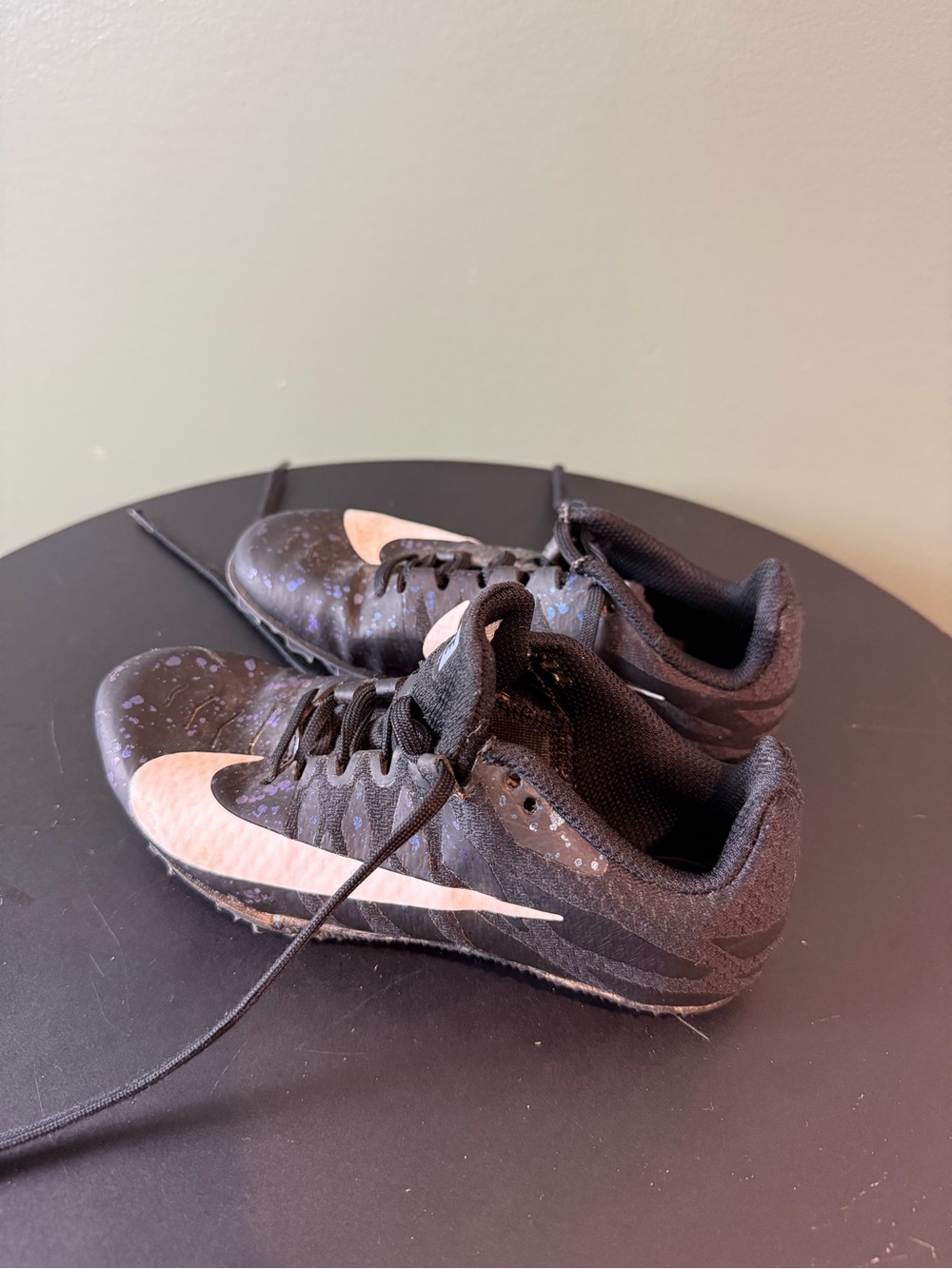 Kids Black Athletic Cleats with White Swoosh